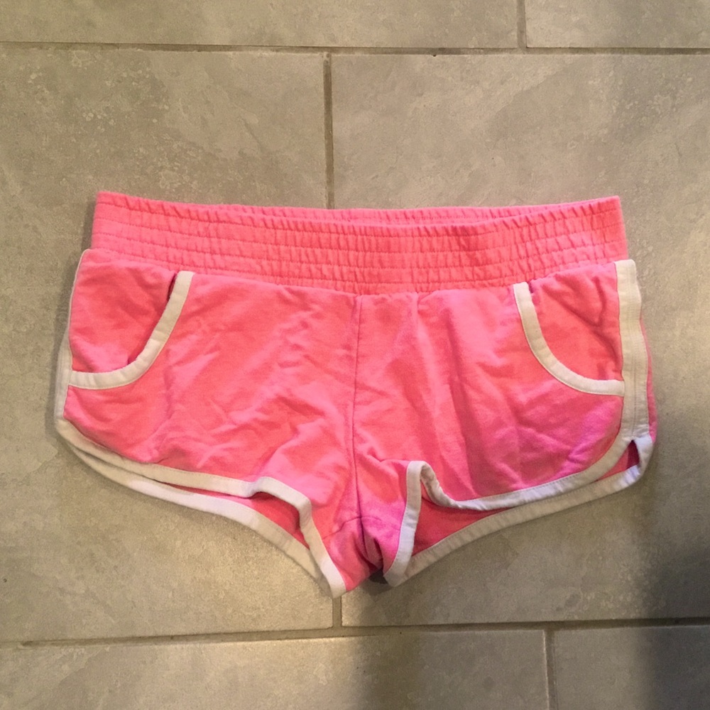 Pink booty shorts with white lining